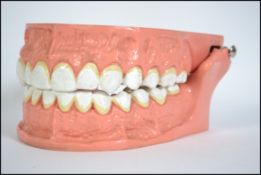 An unusual 20th century retro pair of oversized hinged teeth by Blend a Med. Possible for shop