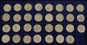 Coins - A collection of thirty silver  coins dating from the early 20th century to include florins
