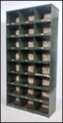 A vintage mid century Industrial sectional metal factory pigeon holes/cubby cabinet unit with