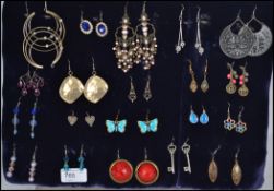 A group of 20 costume jewellery earring pairs to include, Art Deco style, filigree, an enamel