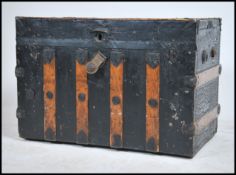 A fantastic 19th century American Steamer trunk within canvas and wooden bindings with applied