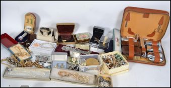 An extensive collection of vintage 20th century costume jewellery to include beaded necklaces, pearl