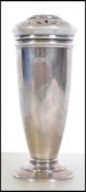 A silver hallmarked sugar caster / sifter having pierced lid with tapering form. Hallmarked for