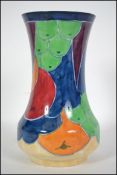 An Art Deco 1930s  Losol Ware Jazzette Goucher vase. Hand painted with vibrant colours. Signed to