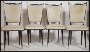 A set of 4 retro 1950's French dining chairs in the manner of Gio Ponti. Each having ebonised frames