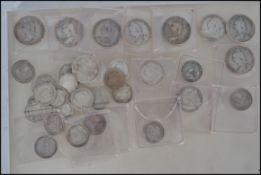 A group of Victorian silver coins to include Jubilee, Mourning and young bust Victoria  florins,