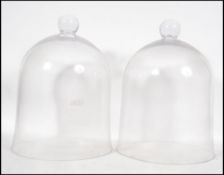A pair of large 20th century glass cloche / cloches - scientific covers or cake stand covers.