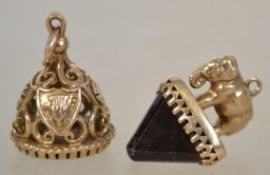 2 9ct gold and agate set pendant - fobs. One with elephant over inverted obelisk end in agate. The