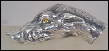 A gentleman's Sterling silver walking stick handle in the form of a boars head. Weight 23.5g.