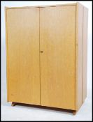 A retro mid century teak wood Danish inspired  Newcraft fold away metamorphic  desk. Having two full