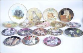 A set of collectors plates from Royal Worcester  from the cats series. Each plate offering a