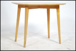 A 1970's Myers teak and smoked glass rectangular coffee table of Danish influence together with a