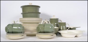 A Wedgwood ' Moss Green ' extensive ceramic mid century part dinner / tea service comprising cups,
