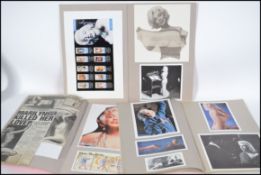A collection of 3 scrap books of Marilyn Monroe to  include photographs , press cut outs, magazine