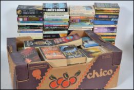 A large collection of vintage and contemporary Science Fiction paper back books to include Authors