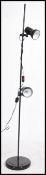 A retro 20th century 1980's black floor standing twin spot / spotlight lamp. Having adjustable