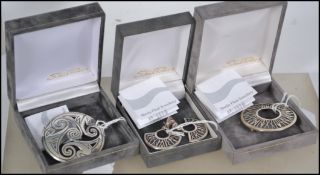 A collection of three Sheila Fleet silver pieces of jewellery in their original boxes.  This lot