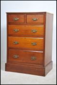 A Victorian mahogany chest of drawers. Of upright pedestal form with short over deep drawer