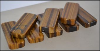 A collection of 8 Botswana Tigers Eye agate stones of lozenge form, each approx the size of a