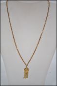 A 15ct gold Victorian ladies box linked necklace and drop pendant. The pendant of drum form with