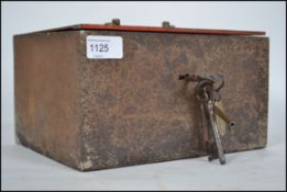 A late 19th century / early 20th century industrial alarmed safety deposit box / cast tin with