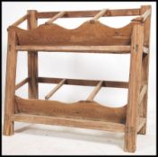 A rustic 19th century pine keg tray stand - agricultural stand raised on block legs and stretchers