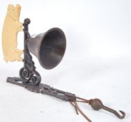 A vintage style, 20th century cast iron pig bell.