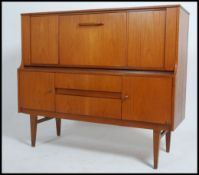 A vintage mid 20th century teak sideboard credenza