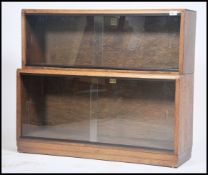 A vintage 20th century set of 2 tier stacking Globe Wernicke style library / lawyer glazed