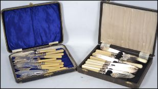 Two boxed sets of silver plated flatware cutlery.  Two sets of fish knives and forks with bone style