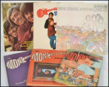 Three vinyl long play LP records by The Monkees to include The Monkees, Headquarters and Pisces