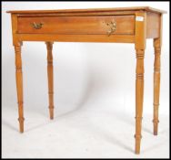 A Victorian 19th century pine writing desk - hall table being raised on turned legs with single