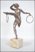 An Art Deco silvered figural dancer figurine stand