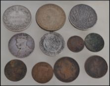 A group of Victorian and earlier coins to include an 1819 George III silver half crown, a