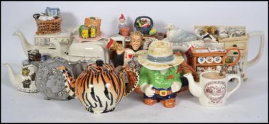 A good collection of collectable of Paul Cardew numbered limited edition teapots. Various designs