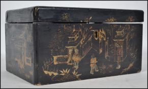 A 20th century Japanese papier mache jewellery box decorated village and mountain scenes, the hinged