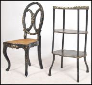 A Victorian ebonised aesthetic movement etargere - whatnot with gilt pierced metal gallery