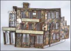 A 20th century hand made copper wall hanging in the form of a Wild Western scene depicting a