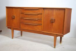 A 1970's Danish inspired Lebus teak sideboard of s