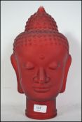 A fantastic 20th century large pressed red glass cranberry glass - thai deity - buddha head.
