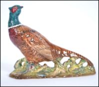 A mid 20th century Beswick ceramic figure of a mal