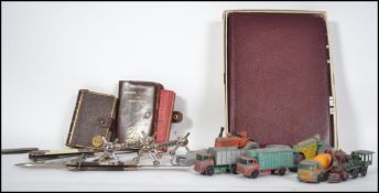 A collection of items to include vintage matchbox / Dinky cars, play-worn. Penknives etc please