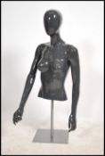 A high quality Italian made mannequin bust with removable adjustable arms and adjustable hands.