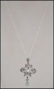 A fine silver high Art Nouveau style necklace and pendant  inset with ruby and opal stones.  Size