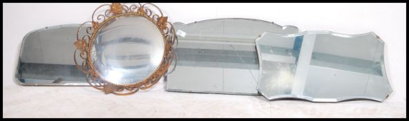 A collection of 3 1930's Art Deco frameless bevelled edge wall mirrors together with a mid century