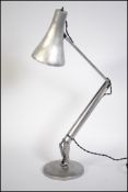 A polished metal post war  - 1950's stripped metal anglepoise Industrial desk lamp raised on a