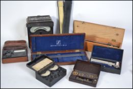 A collection of vintage engineers tools / items to include cased meters, slide rules, measuring
