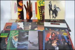 A collection of vinyl long LP's albums to include Genesis x 4, Focus, Fleetwood Mac Rumours and