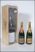 A large cased Magnum of Brut Champagne by Cudinot A Epernay together with further bottles of