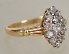 A vintage 18ct gold and diamond ladies marquise shaped diamond ring - cluster ring. Total weight 3.
